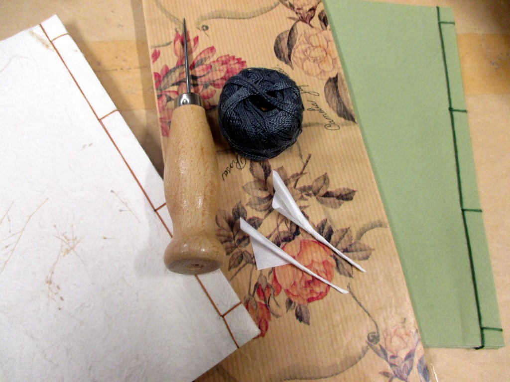 ENSIMMÄISET PAPERINAULANI